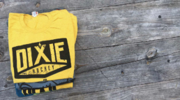 Dixie Hockey Company logo, representing the original Southern hockey shirt design