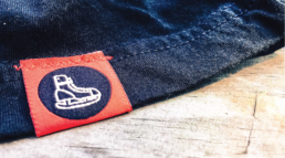 Dixie Hockey Company logo, representing the original Southern hockey tags for shirts